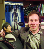 Lawrence Krauss posing with Spock doll
